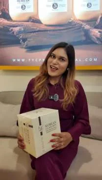 Creator holding FYC product box